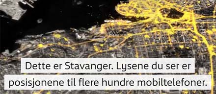 Flygbild över Stavanger på natten där huvudgatorna lyser gult
